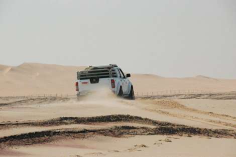 driving in sandy Namibia